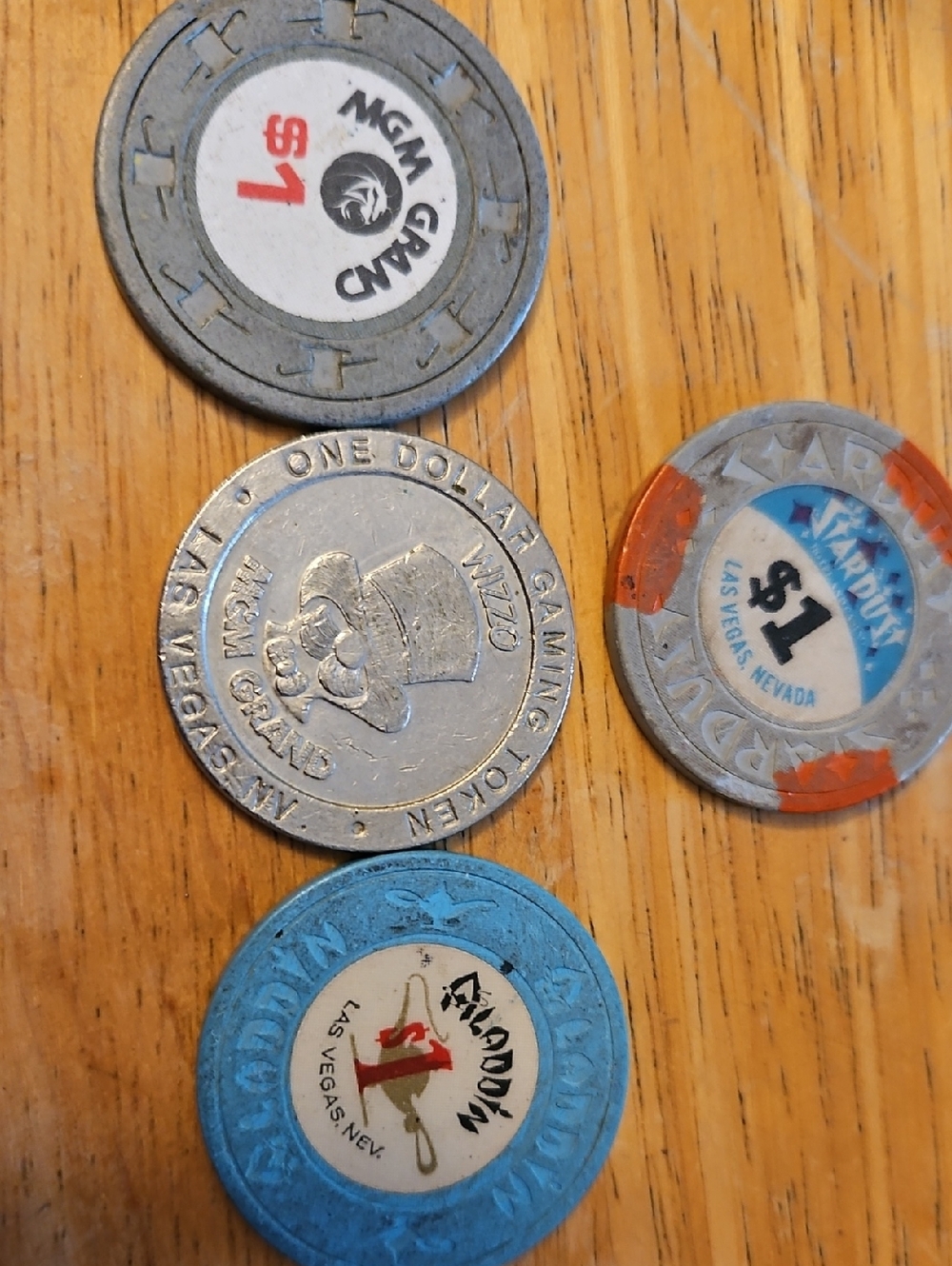 Set of 4 Vintage $1 Casino Chips - Stardust, Aladdin, MGM Grand